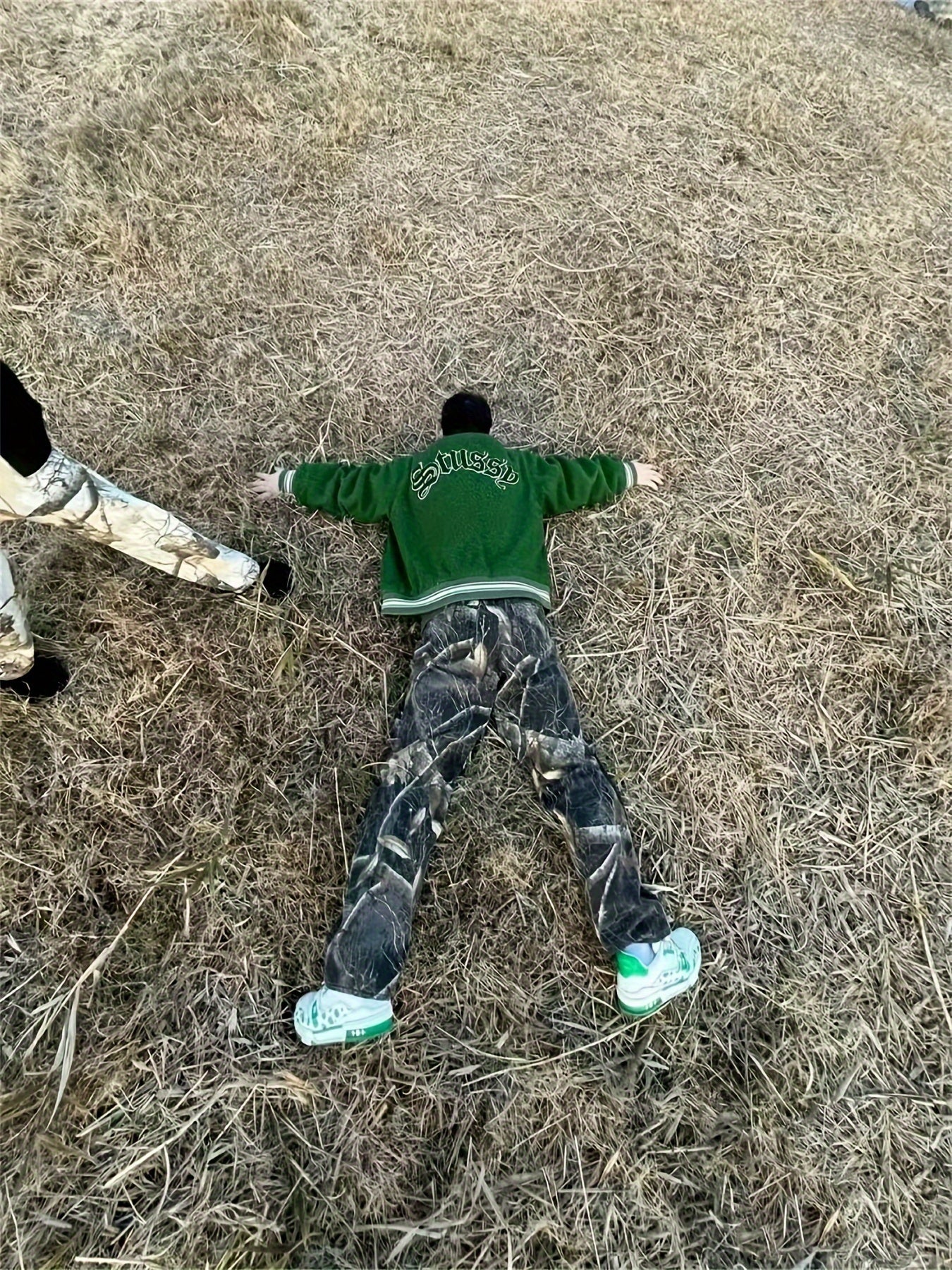 Wang Jiaer’s Camo Jeans: Graffiti Print, Lifelike Maple Leaf Design Camo Colors